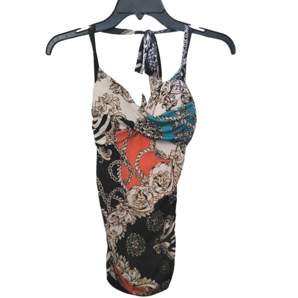 Print all over. Halter neck backless top